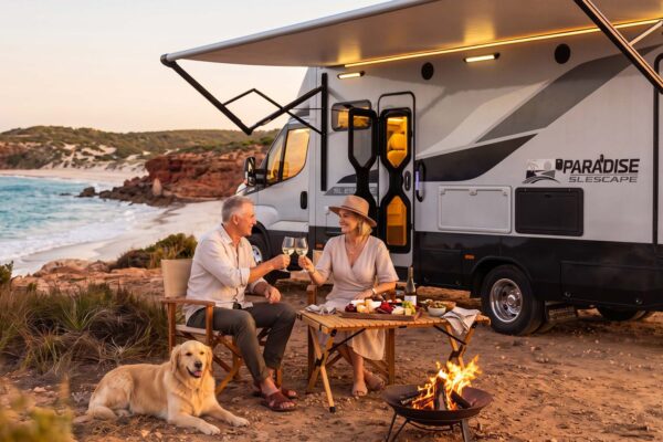 Paradise SL Escape set up with awning and campfire by the coast Paradise SL Escape set up with awning and campfire by the coast